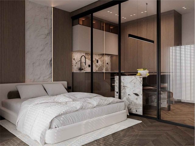Спальня апартамента Swiss Luxury со стеклянной перегородкой в кухню-гостиную
